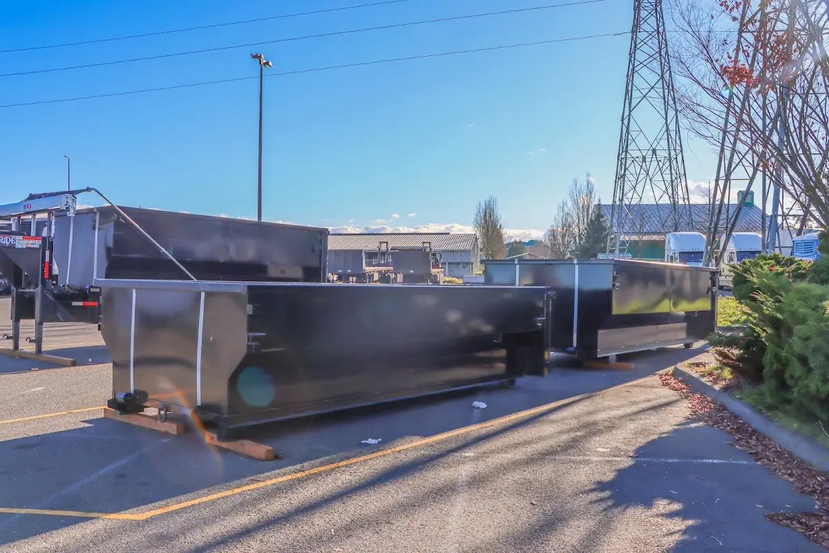 Roll-off dumpster ready for waste disposal at job site for Concrete Dumpster Rental in Carver